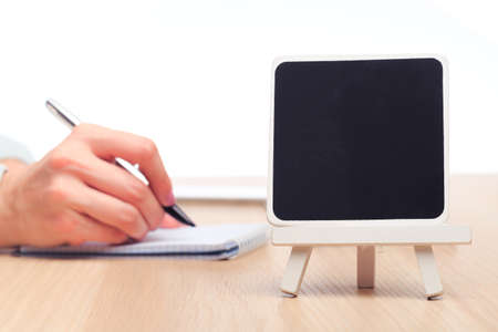 female hands write in a notebook . Place for your textの写真素材