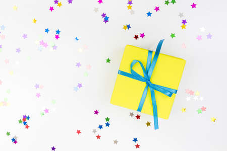 Colorful confetti and presents on white background text place - Imageの写真素材