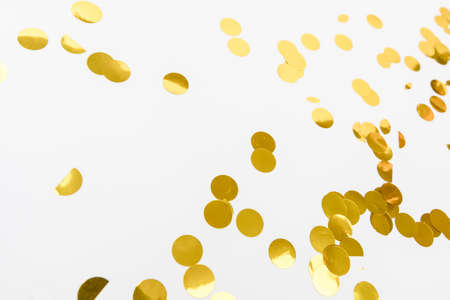 golden confetti on white background flat lay text place - Imageの写真素材