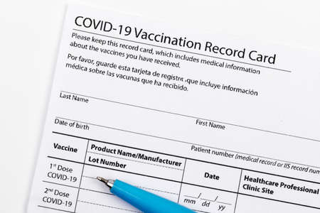 Covid 19 vaccination record card for individual use during the covid 19 coronavirus global pandemicの写真素材
