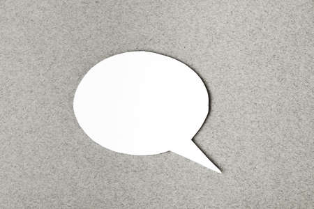 paper speech cloud on gray backgroundの写真素材