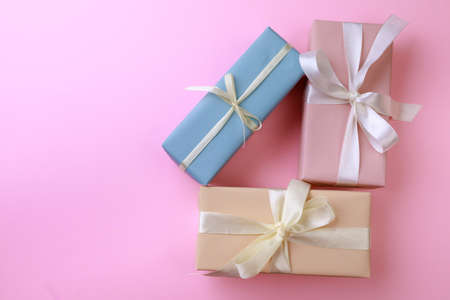 Gift boxes on color background. Happy womens day. Happy Mothers day.Hello Spring