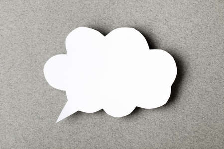 paper speech cloud  on grey backgroundの写真素材