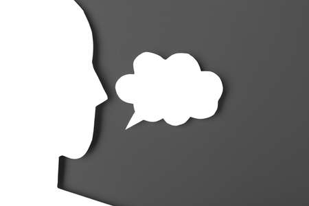 paper face and speech bubble on colorbackground copy space for text, communication, symbolic