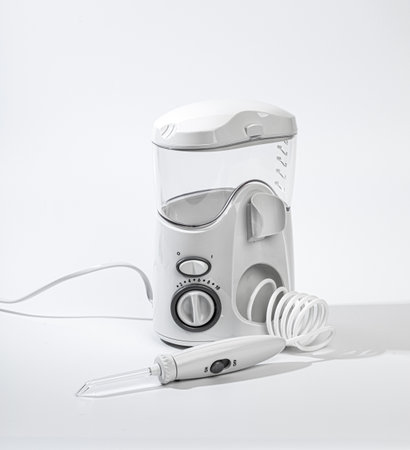irrigator for oral care on a light backgroundの写真素材