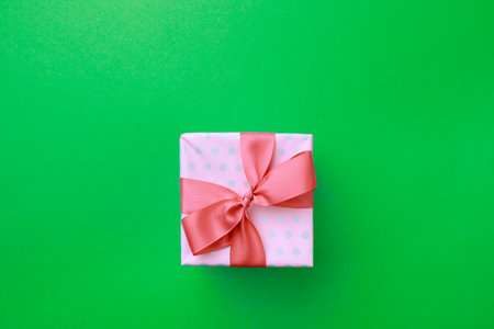 Gift box on color background. Happy womens day. Happy Mothers day.Hello Springの写真素材