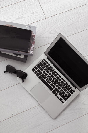 laptop in a modern interior in minimalist styleの写真素材