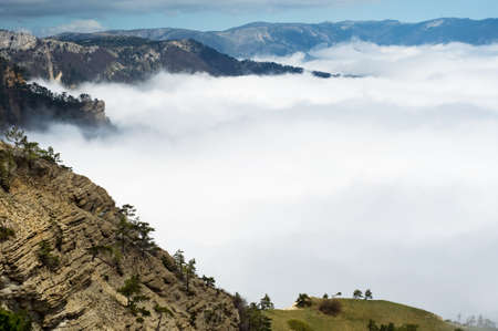 On the top of mountaim over clouds.の写真素材