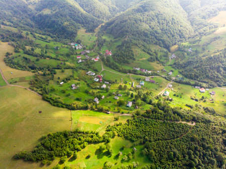 Photo taken from a drone. View of the rural highlands. Sunny summer day.