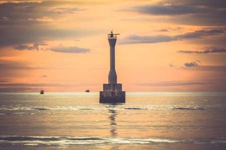 Lighthouse in the seaの写真素材