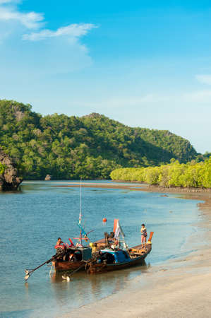 Fishing boats in sea and mangrove forest of Thailandのeditorial素材