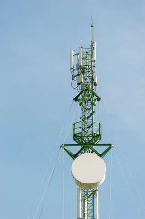 Telecommunication mast TV antennas with blue sky