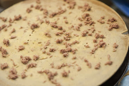 Crispy pancake, Making crepe pizza egg with cream mayonnaiseの写真素材