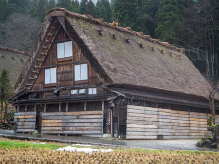 Traditional and Historical Japanese village Shirakawago, Japan - December 22, 2016 : The view of Traditional Japanese village Shirakawago in autumn season, The unique farmhouse called "Gassho" is world heritage of Japanのeditorial素材
