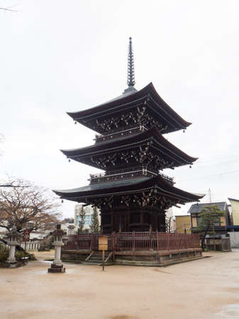 KYOTO, JAPAN - December 20 2016: Tourists wander a famous street, Sannen-Zaka, in Kyoto on December...