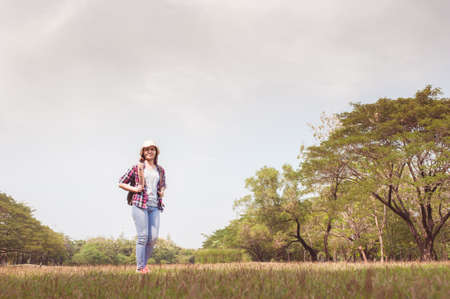 Woman with relax time at the park ,and happy enjoying in the natureの写真素材