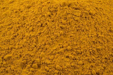 Heap of turmeric,Turmeric (Curcuma) powder isolated on white background.の写真素材