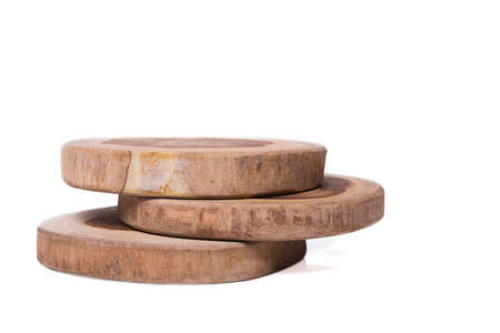 wooden round chopping board isolated on white backgroundの写真素材