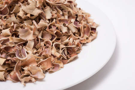 Dry Bael Fruit tea (Aegle marmelos) isolated on white background