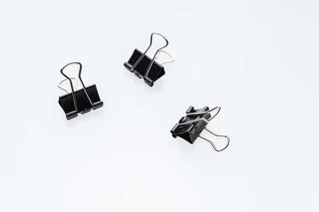 Binder clips for paper on a white background