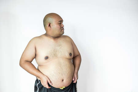 Fat man ,overweight man with big belly on white background in studio.