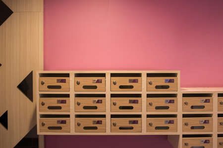 Modern Wooden Mailbox In Condominiumの写真素材