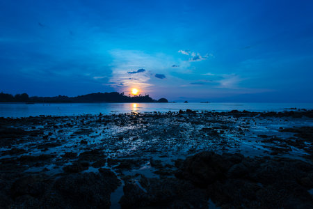 View beautiful sunset of a rocky coast and sea in the morning.の写真素材