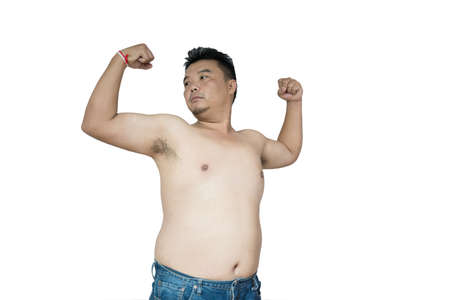 Fat man ,overweight man with big belly on white background in studio.の写真素材