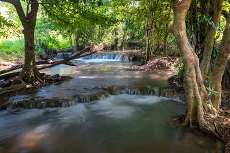 Waterfall green forest river stream landscape ,Waterfall hidden in the tropical jungle at National Park,Thailand.の写真素材