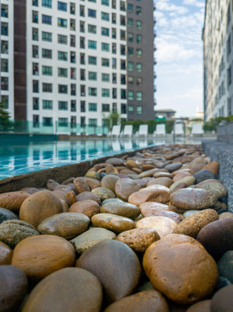 Swimming pool among high rise condo buildings ,Bangkok, Thailand