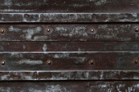 Abstract background, rusty metal plate with bolt and structure