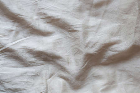 White silk with textured effect as abstract background.