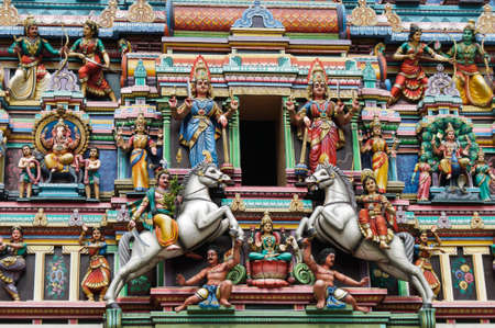 Colorful  holy figure on the facade outside from the hindu Temple in Malaysia.の写真素材