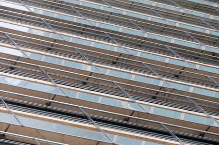 Abstract background of a glass facade of modern architecture.