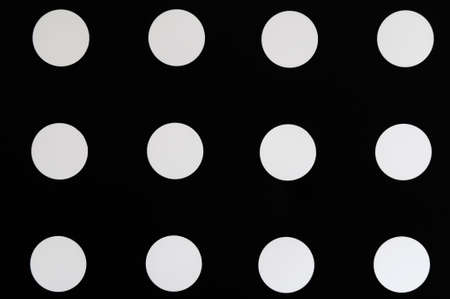 Abstract background, black surface with twelve white pointsの写真素材