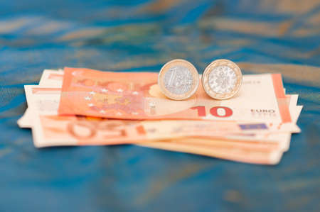 One Portuguese euro banknotes in front of blue background.の写真素材