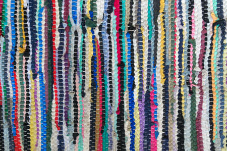 Abstract background from a colored carpet.の写真素材