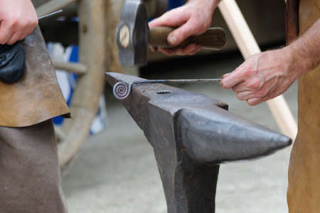 Old crafts, blacksmith at work.