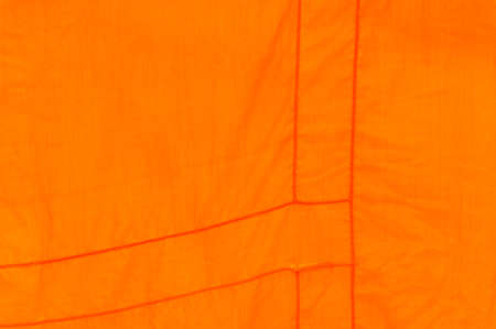 Abstract woven textile orange background.の写真素材