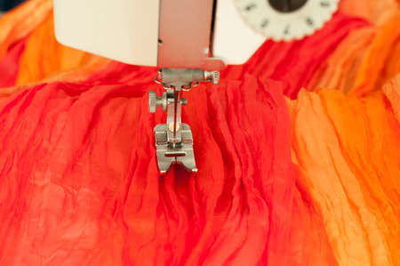 Production of garment with a sewing machine.