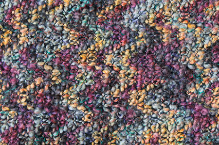 Abstract woven colored wool background.