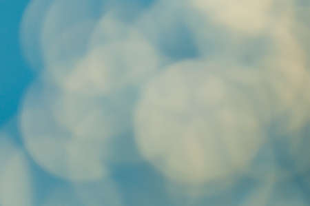 Abstract blue blurred retro background with light spots.の写真素材