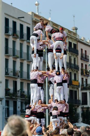 Catalan human towers Castells National Day in Barcelona 09/11/2014. The Castells symbolize the solidarity and stability of the Catalan nation.のeditorial素材