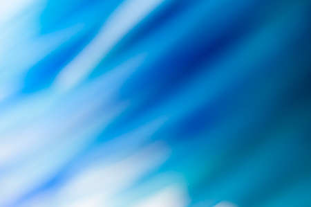 Abstract blue blurred background with textured effect.の写真素材