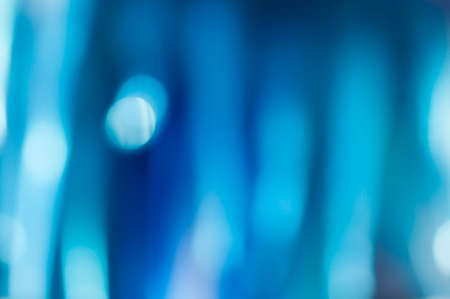 Abstract blue blurred background with textured effect.の写真素材