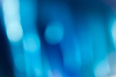 Abstract blue blurred background with textured effect.の写真素材