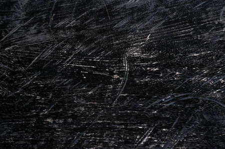  Weathered scratched black wooden background.の写真素材