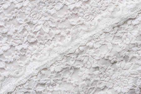 White lace as an abstract background with texture.の写真素材