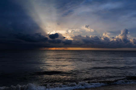 Dark blue ocean with dramatic sky.の写真素材