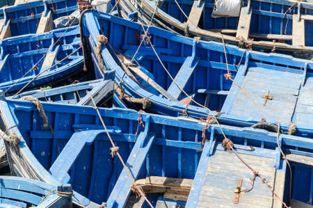 Blue fishing boats in the port of Essaouira, Morocco, Africa.